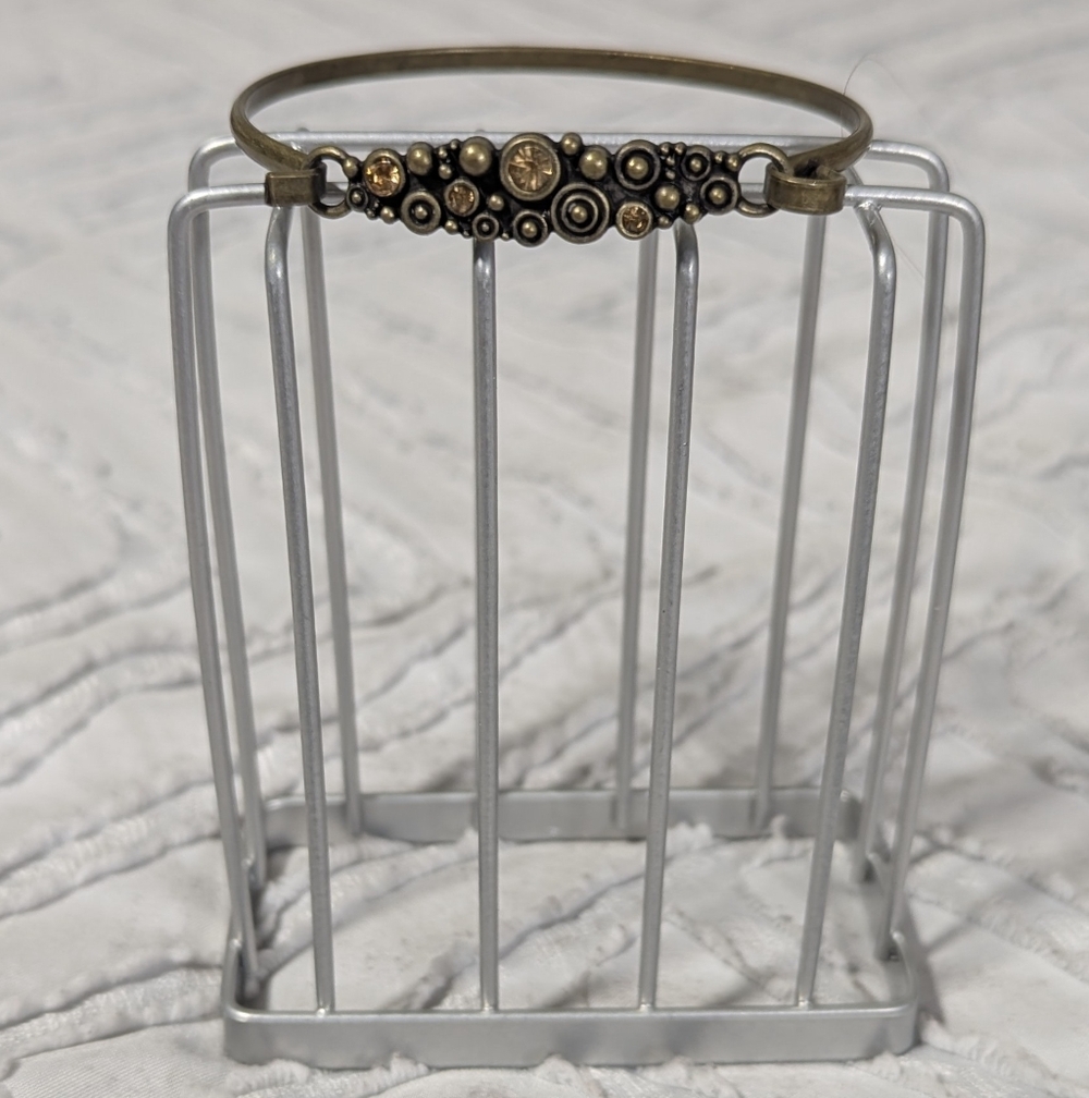 Antique Brass Tone Bangle Bracelet with Embellished Circle Accents